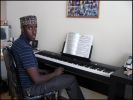 Dooh practicing Piano